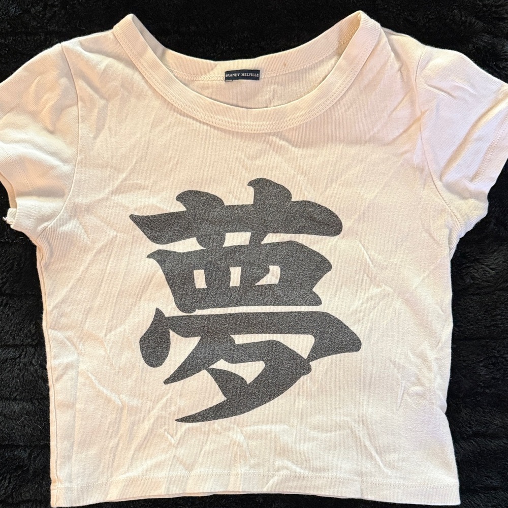 Brandy Melville Cream Crop Top with Black Graphic